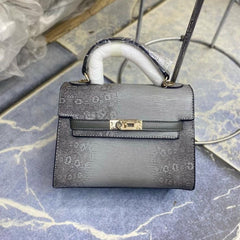 The Embossed Hand Bags