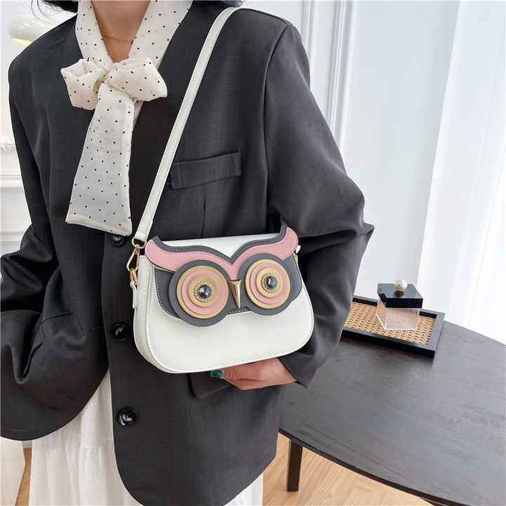 Elegant owl sling bag