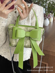 Denim bow sling bag