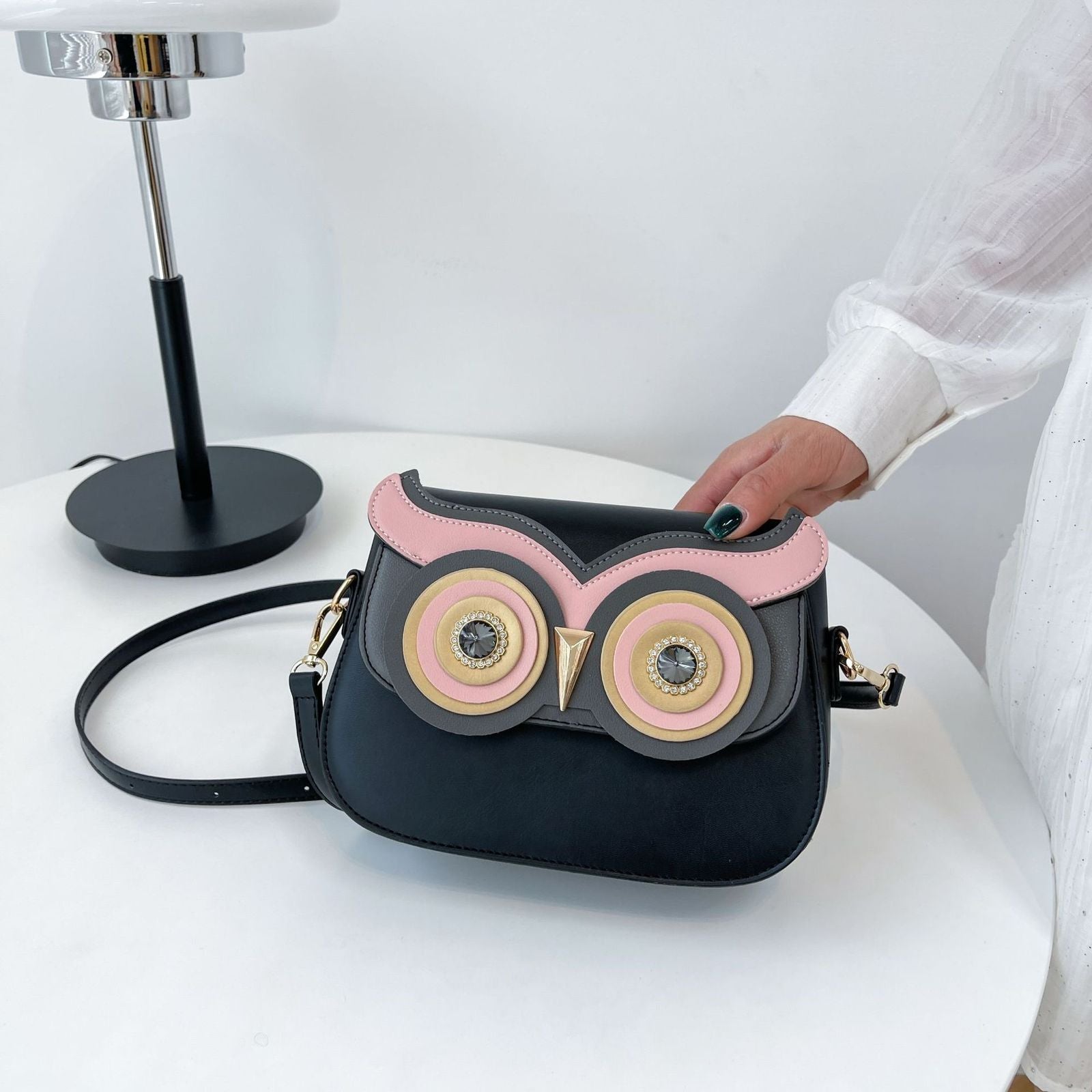 Elegant owl sling bag