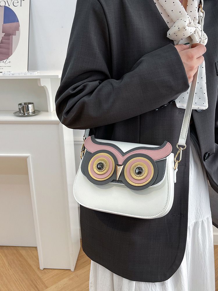 Elegant owl sling bag