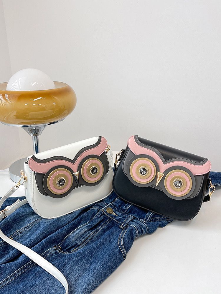 Elegant owl sling bag