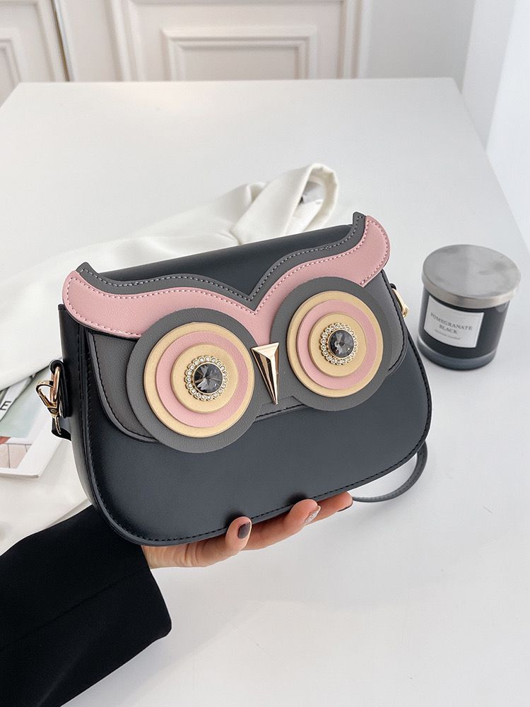 Elegant owl sling bag